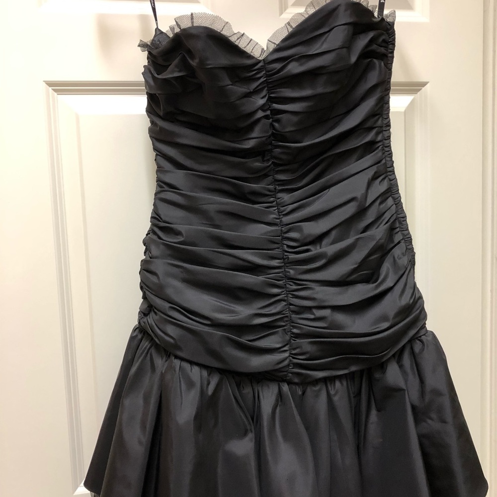 Women’s black dress by Betsey Johnson